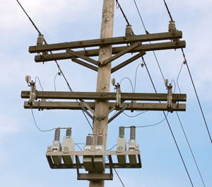 Capacitors improve the power factor on the utility lines — they prevent power from being wasted and help boost the voltage on long, rural distribution lines. Sources: Shelby Energy Cooperative, United Utility Supply