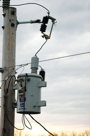 Below, transformers lower voltage to a level that’s safe for use in your home. Homes served by electric co-ops can often be identified by transformers sporting redundant mounting brackets on the outside of the canister. Sources: Shelby Energy Cooperative, United Utility Supply