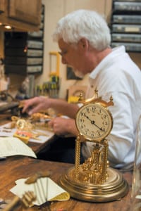 A customer’s clock awaits its turn on Howell Rust’s workbench. Rust estimates that he repairs 60 to 70 clocks each month, and the average turnaround time is six to eight weeks.