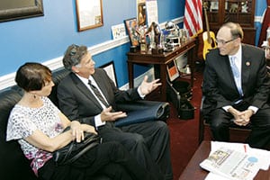 Mountain Electric Cooperative General Manager Joe Thacker, center, and wife Margaret talk with Rep. Phil Roe. Photograph by Chris Kirk, TECA