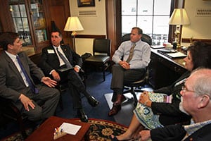 Co-op representatives discuss legislation with Rep. Stephen Fincher. Clockwise from left are Tennessee Electric Cooperative Association Director of Government Affairs Mike Knotts, Gibson Electric Membership Corporation President and CEO Dan Rodamaker, Rep. Fincher and GEMC board members Rana Buchanan and Steve Sanders. Photograph courtesy of Luis Gomez Photos.