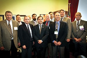 Officials from Plateau Electric Cooperative, Sequachee Valley Electric Cooperative and Volunteer Energy Cooperative meet with Rep. Chuck Fleischmann. From left are Sammy Norton and Mike Frazier, VEC ; Dave Cross, PEC; Jerry Henley, VEC; Lee Armstrong, PEC; Rep. Fleischmann; Rody Blevins, VEC; Mike Partin and Bob Matheny, SVEC; Jack Simmons, TVPPA; and Jim Litton, PEC. Photograph courtesy of Luis Gomez Photos.