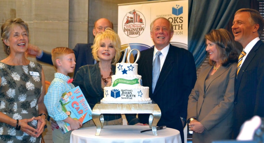 Theresa Carl, president of the Governor’s Books from Birth Foundation, is joined by  6-year-old Dawson Dykes of Columbia, Dolly Parton, former Gov. Phil Bredesen and the Haslams.