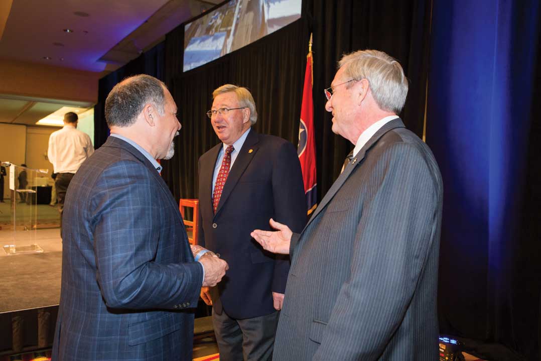 From left, TECA’s David Callis, retired Holston EC General Manager Larry Elkins and Middle Tennessee EMC board member Tom Purkey visit between sessions.