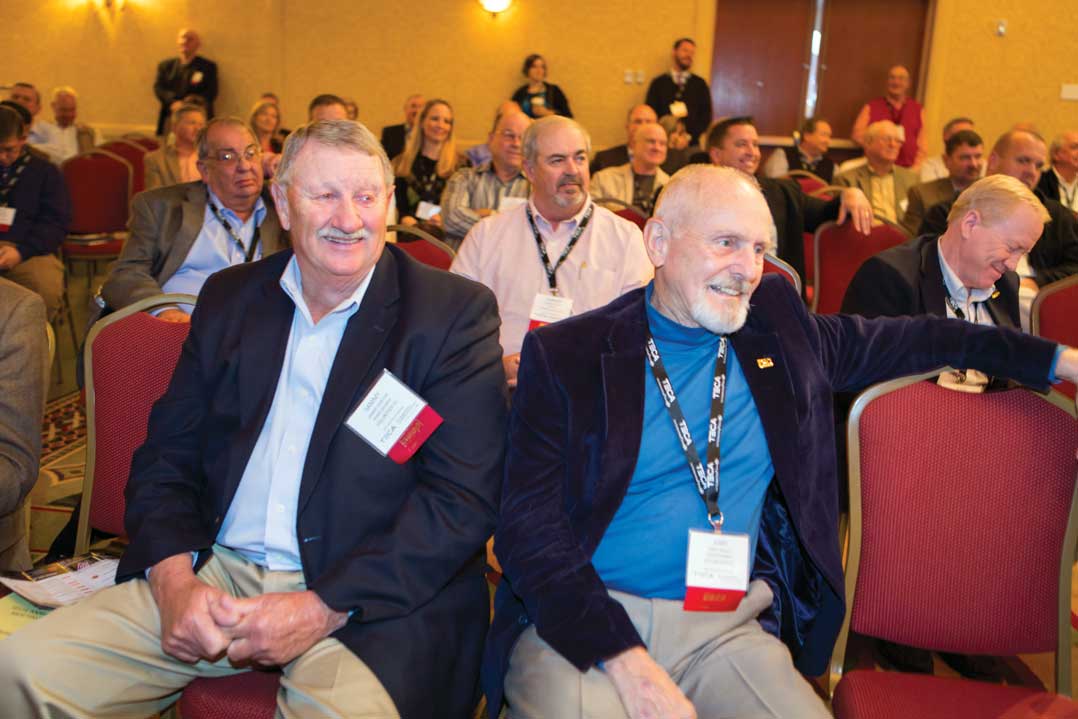 Sammy Norton, left, and Jerry Henley from Volunteer Energy Cooperative as well as representatives from other Tennessee electric co-ops enjoy a session at the annual meeting.