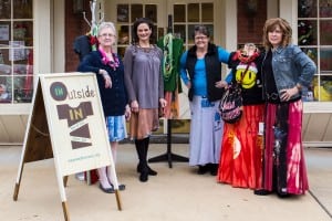 OUTsideIN Vice President Jean McMillan; employees Kristi Smith and Lisa Salazar; and founder LeEllen Smith sport some of the fashions they have created from cast-off T-shirts. The cottage business in Troy is dedicated to giving local women a second chance. 
