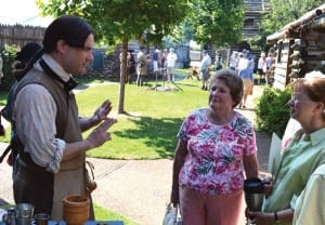 Visitors hear stories about pioneer life in Nashville from an interpreter at Fort Nashborough, which for years hosted historical, educational programming.