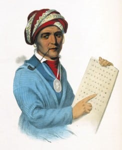 Sequoyah holds a tablet that contains his Cherokee syllabary in this lithograph courtesy of the Library of Congress.