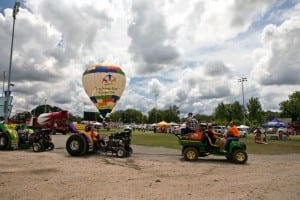 The open Modified Mini Tractors get a tow to the start line. The TSE balloon will be on hand again this year to give spectators a free tethered balloon ride if weather permits.