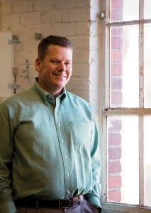 Bill Carey stands in his downtown Franklin office.