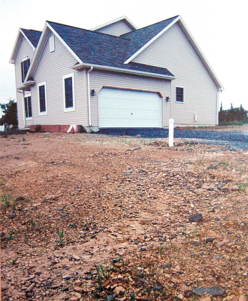 The future owners of this new home may not realize that this compacted shale soil is lurking below.