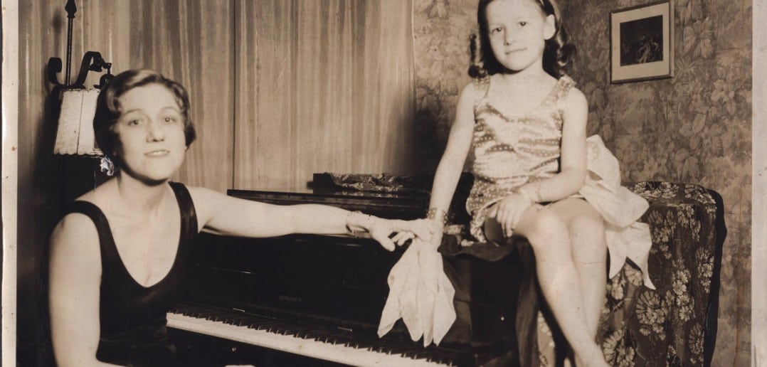 Baby Eleanor with her pianist, Ruth Ann Moore. Eleanor’s family always tried to travel together for her appearances. She started singing and dancing on the radio to promote her father’s drug store, which was then in Louisville, Kentucky, but she was soon being heard across America.