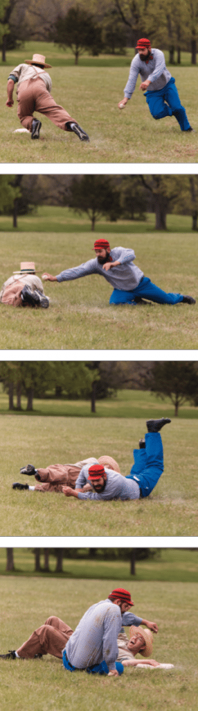 A Distiller ballist dives for the base while a Lightfoot opponent unsuccessfully attempts an out.