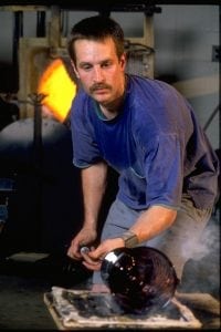 Appalachian Center for Craft (ACC) professor Curtiss Brock puts the finishing touches on a glass vase. “Working in glass is not for everyone,” he stresses. “It’s hard work, it’s hot and one wrong move can destroy hours of work. But if you have a passion for it and a love for the material, there’s just nothing better.”