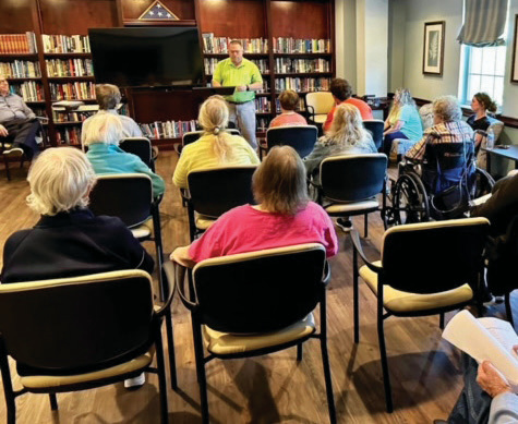 David Coggin, Barnabas Vision executive director, presents information to a group of members.